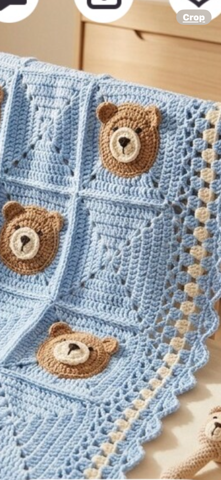 Close-up of the pink and black crocheted ladybug design and border