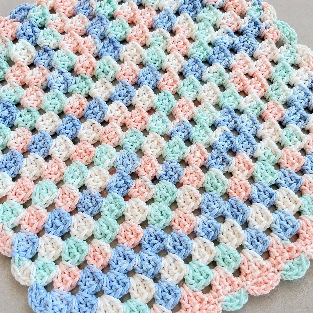 Blue pink multi color Crochet Baby Blanket | Handmade Chunky Velvet Artisan Blanket | Lively Distinct Designs. Lively Distinct Designs Inc